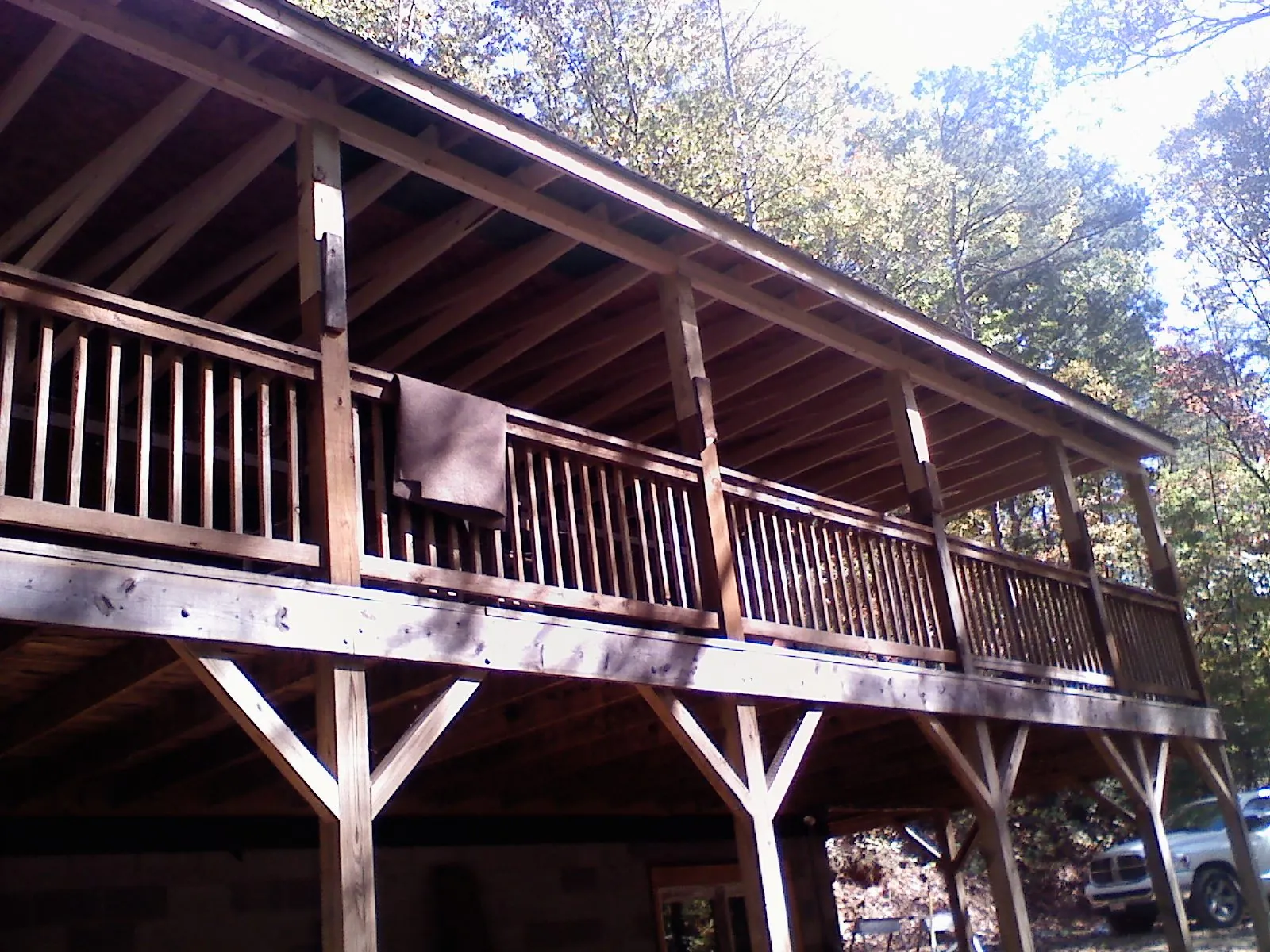 Timber framing under a new elevated porch and deck — Roof Leak Repair in Sheffield by Roofing Brothers
